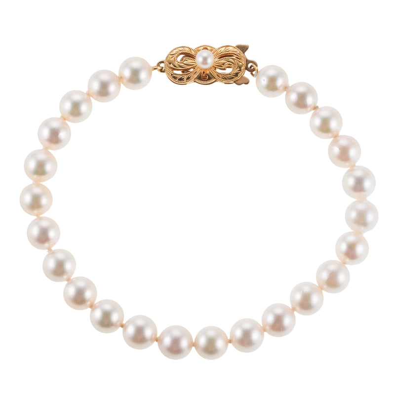 Elegant Mikimoto Double Strand Pearl Bracelet with 18k Gold Clasp